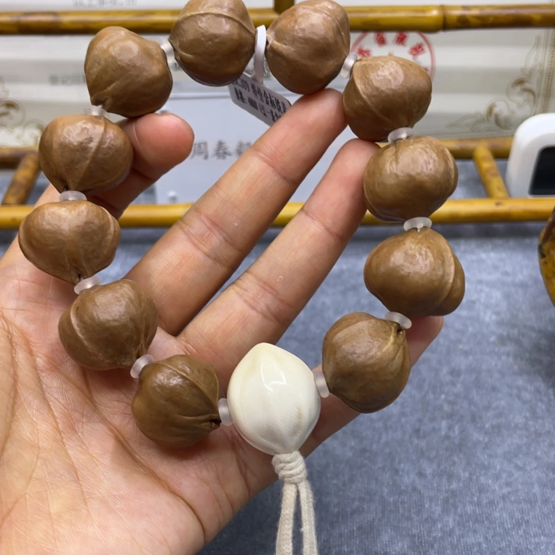 橄榄核吊坠铁素手串