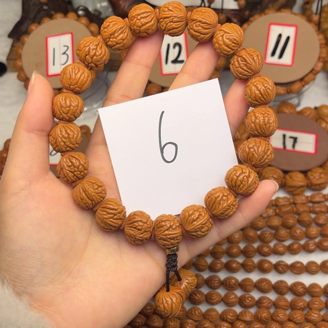 核桃龙纹桃核手持肚卡16荔枝纹