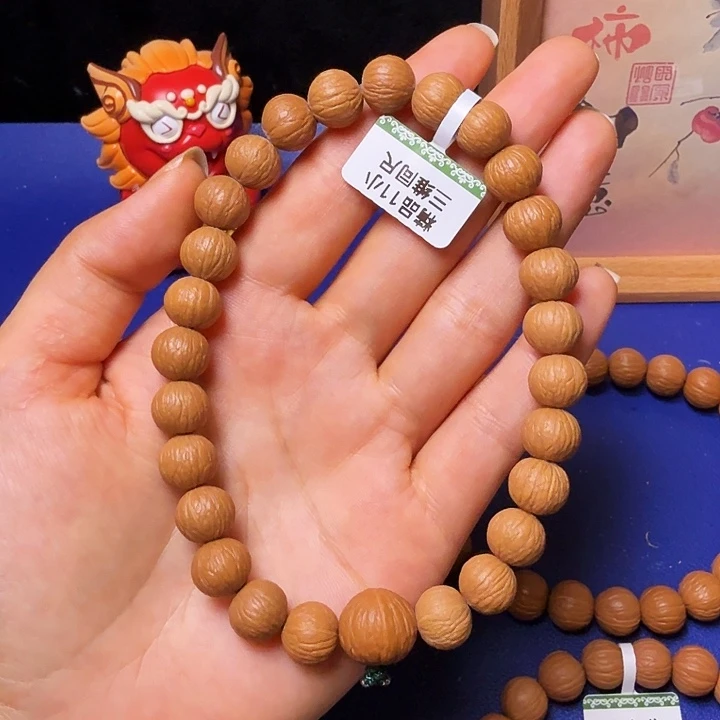 啊***森猴头核桃吊坠凤羽