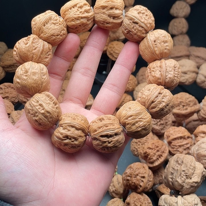 孤***独吊坠文玩核桃4元宝