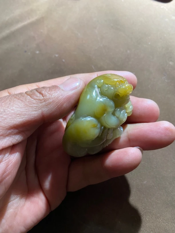 和田玉手把件貔貅