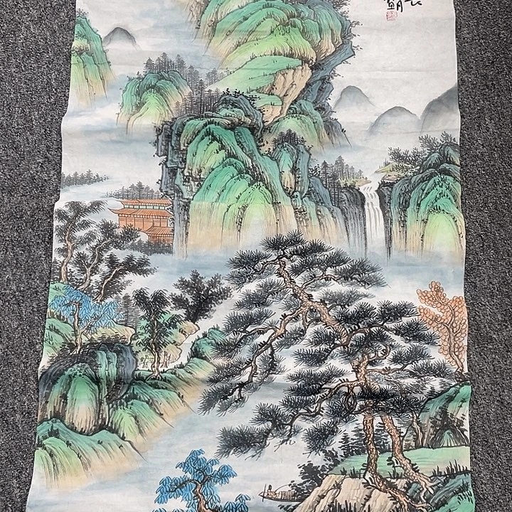 国画卖字画的小男孩