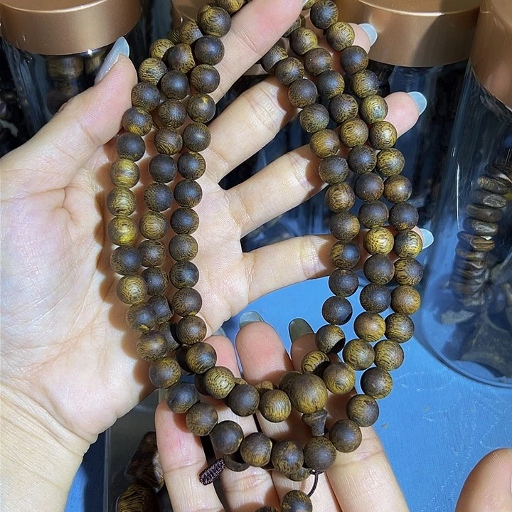 沉香手串彩***！多圈老料卡9圆珠乌身圆叶42