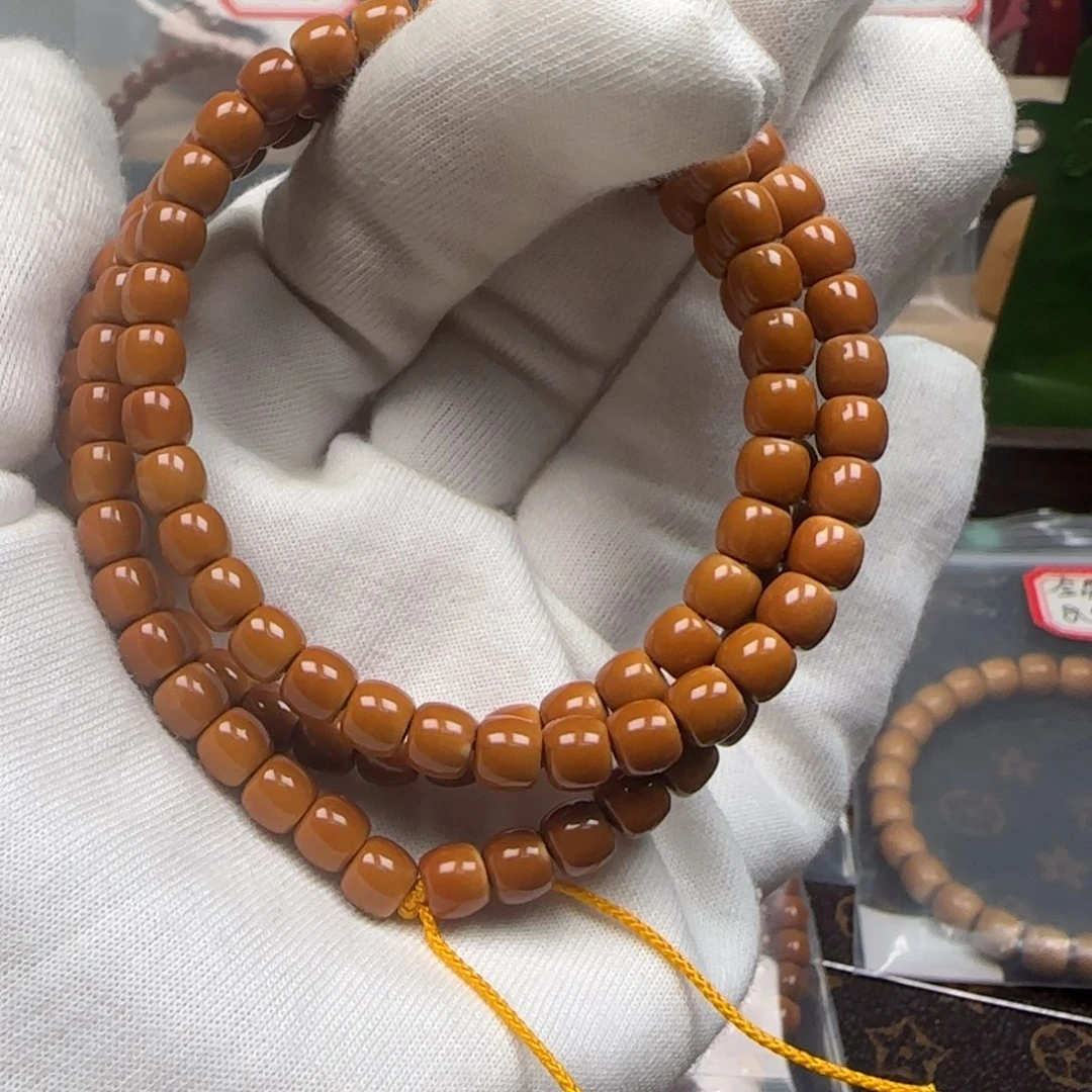 手串橄榄核老挝长串正三花极限弧6.2mm