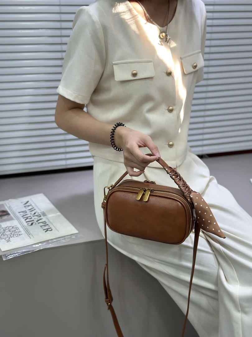 真皮包包女2025春夏新款相机包时尚百搭斜挎包手提休闲女士单肩包