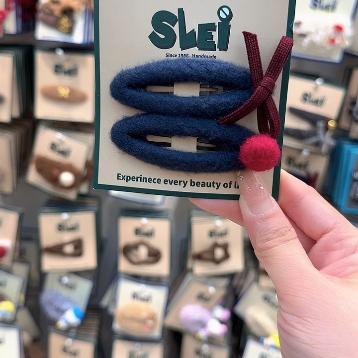 藏蓝色椭圆红色蝴蝶结掰掰