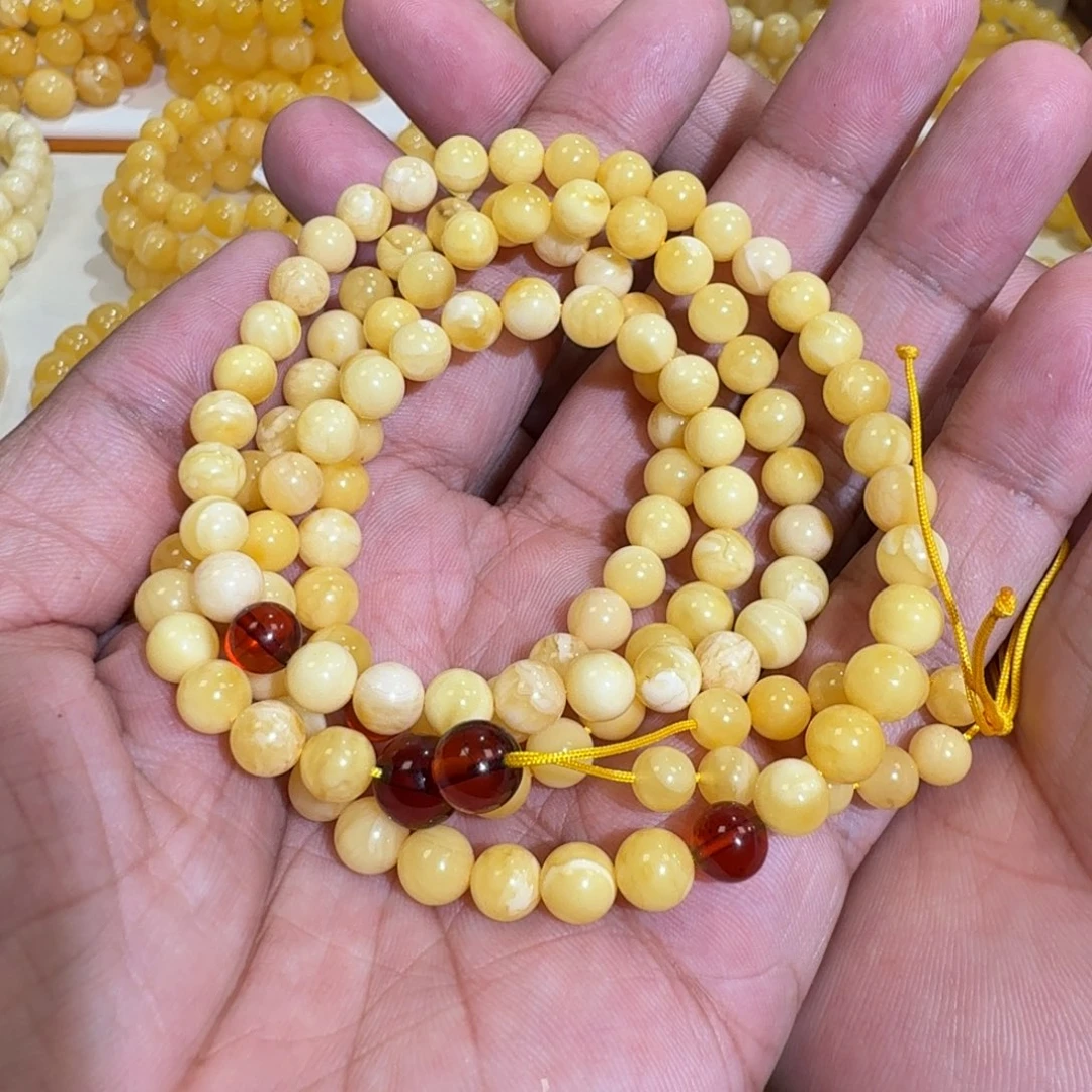 琥珀未镶嵌珠宝奇石6.5m+白花蜡佛珠20克