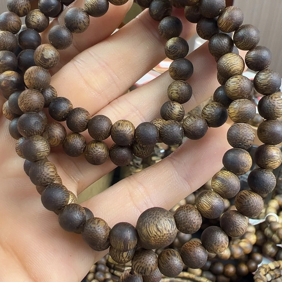 沉香碎屑沉香金沙叶品种沉水浮卡0.6大多圈17克加