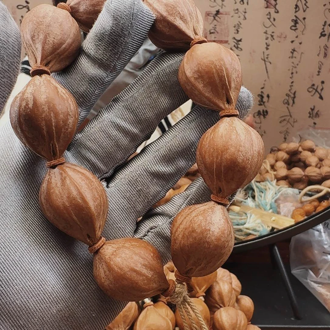 伍***七橄榄核手串蒜头核