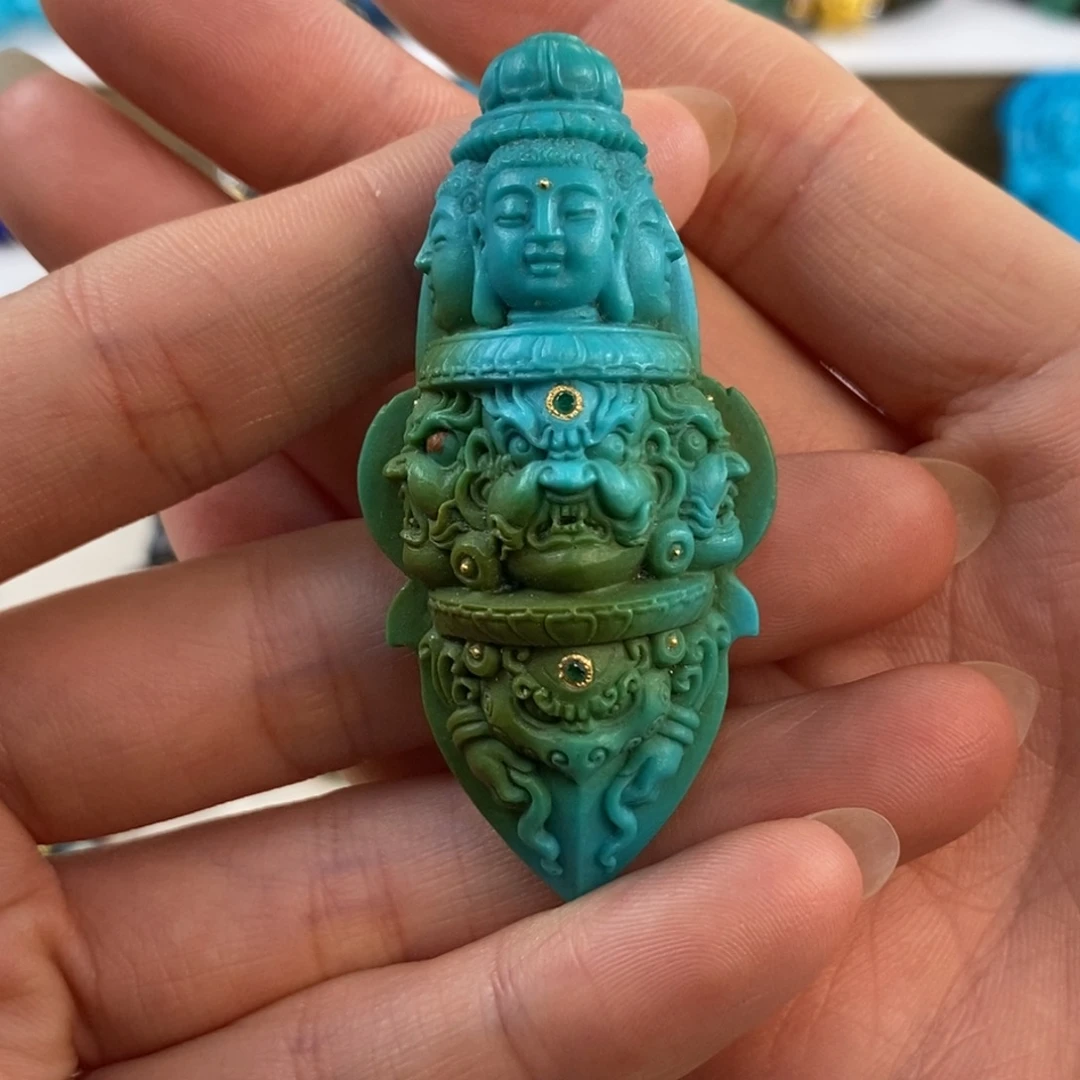 绿松石未镶嵌。三面杵