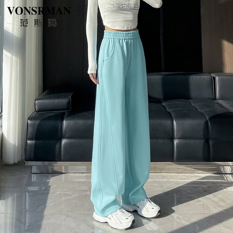 湖蓝色运动阔腿裤女2025秋季新款时尚弯刀裤松紧腰直筒宽松香蕉裤