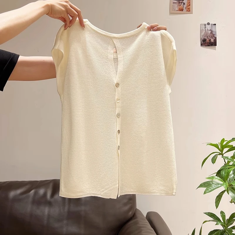 休闲百搭后背镂空单排扣圆领针织衫女洋气独特别致女装小衫新款