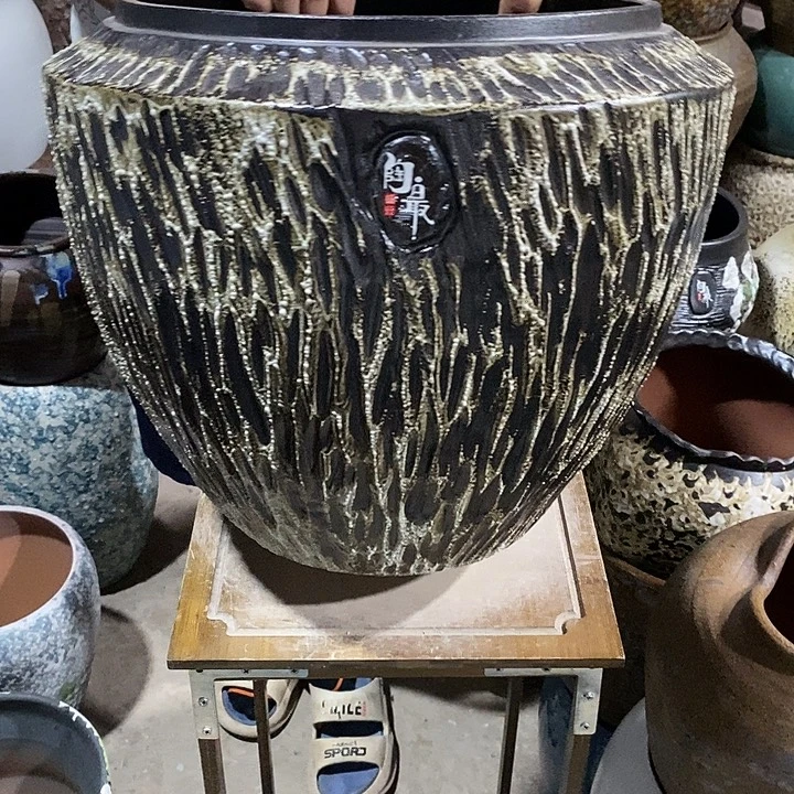 紫砂花盆口32高度36……………