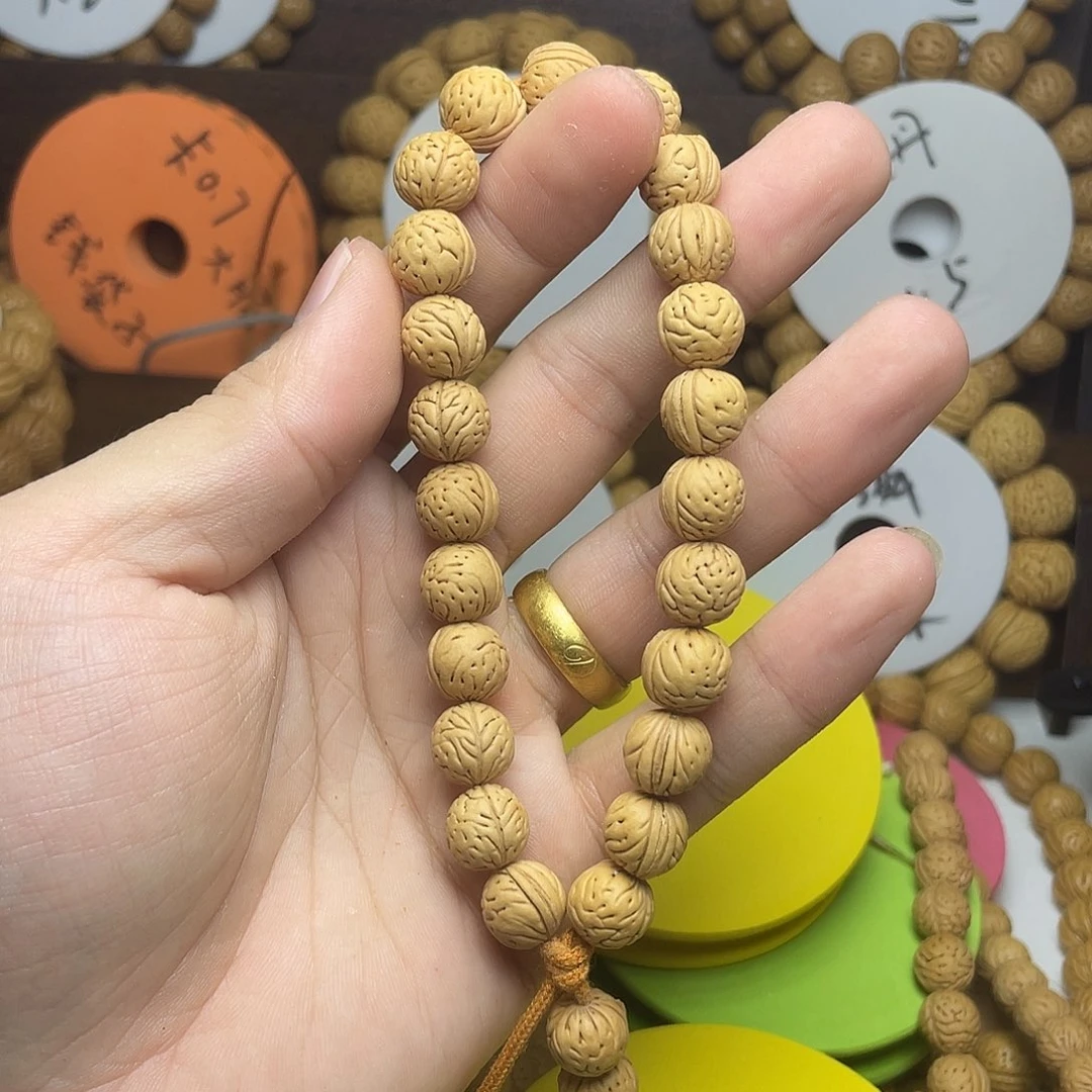 橘***。桃核吊坠山西野生肌肉10.7