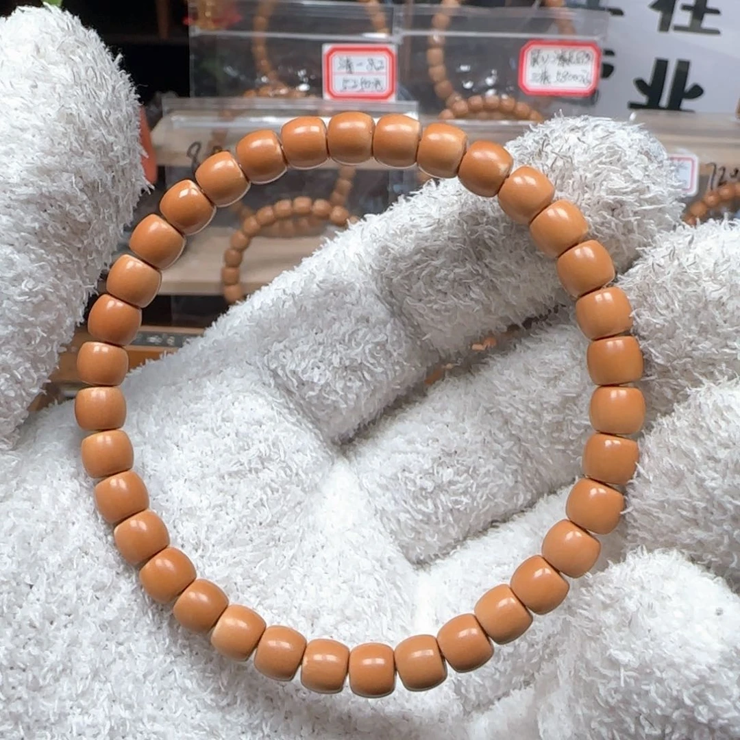 六***》橄榄核吊坠清水树王6.7mm三花单圈