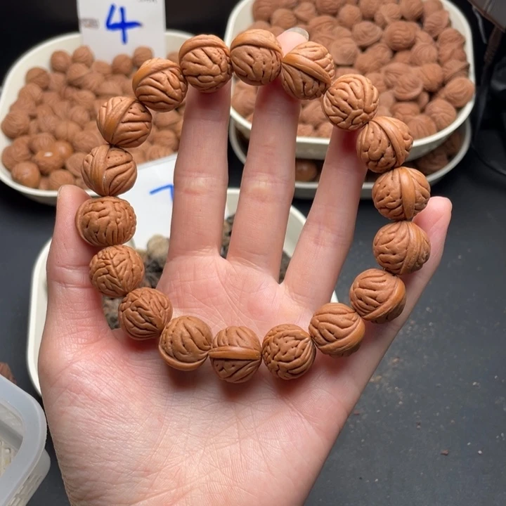 桃核吊坠袁*玉麒麟手串