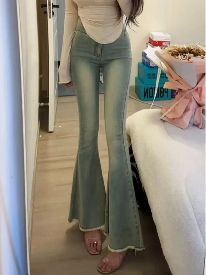 天一~纯欲大码微喇牛仔裤女2025早春爆款高腰双扣显瘦喇叭裤99213