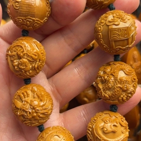 努**蔡龙生九子橄榄核手工