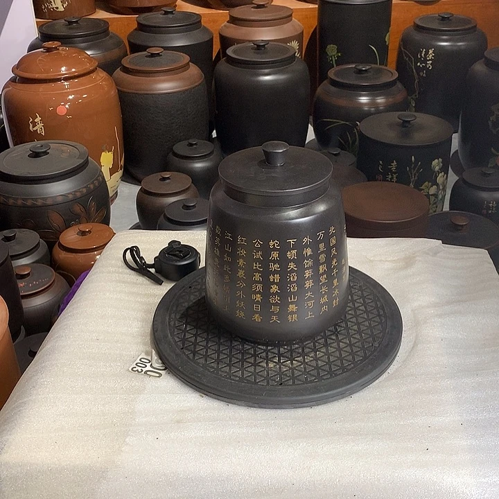 字画茶罐。