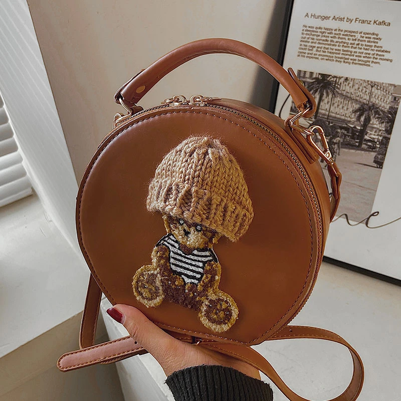 高级感可爱小众手提包包女春夏2025新款时尚少女斜挎包洋气小圆包