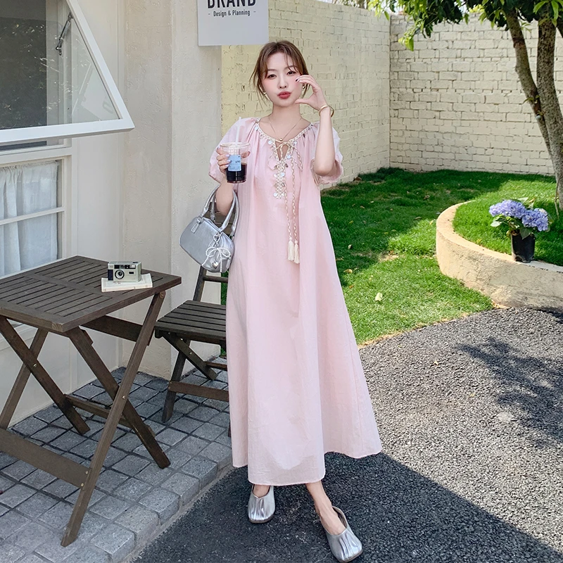 民族风波西米亚连衣裙女2025夏新款超好看复古绑带亮片泡泡袖长裙