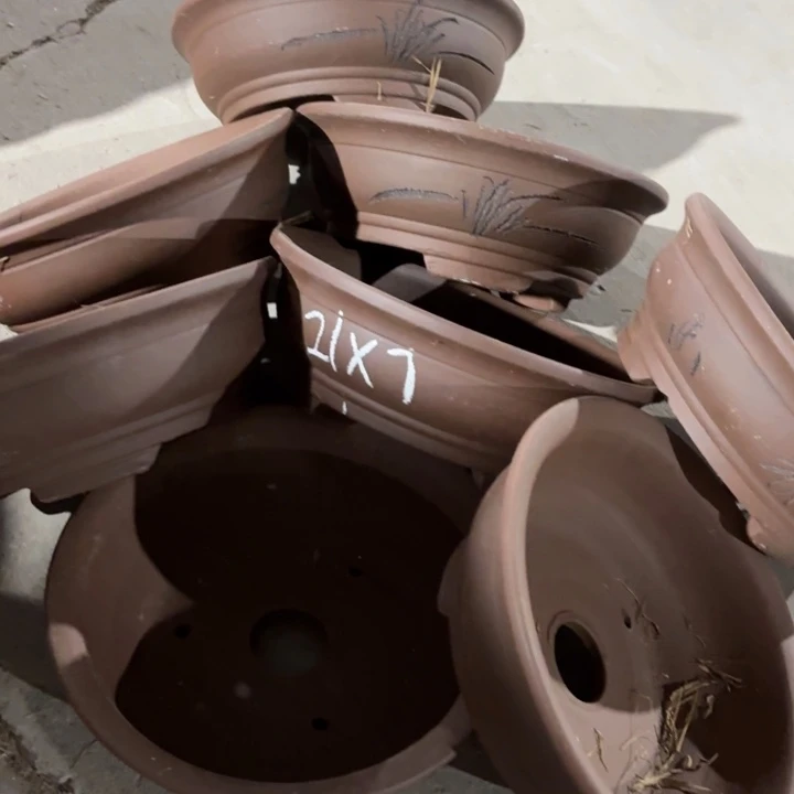 紫砂花盆100:8。   21-7。