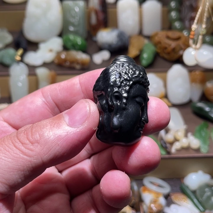 佛***子透闪石质玉未镶嵌吊坠(不含链)