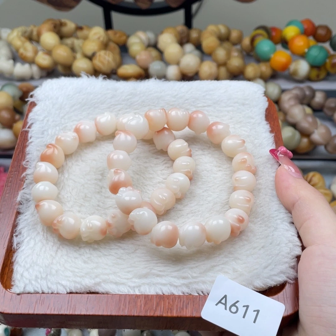 菩提根/象牙果吊坠瑕A611猫爪12mm一串随机