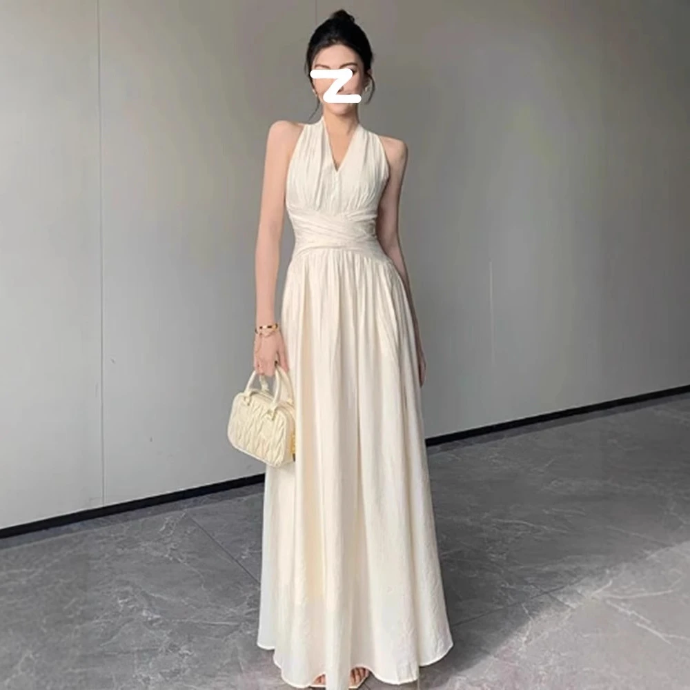 法式白色无袖挂脖领连衣裙女2025夏季新款绝美收腰显瘦大摆长裙