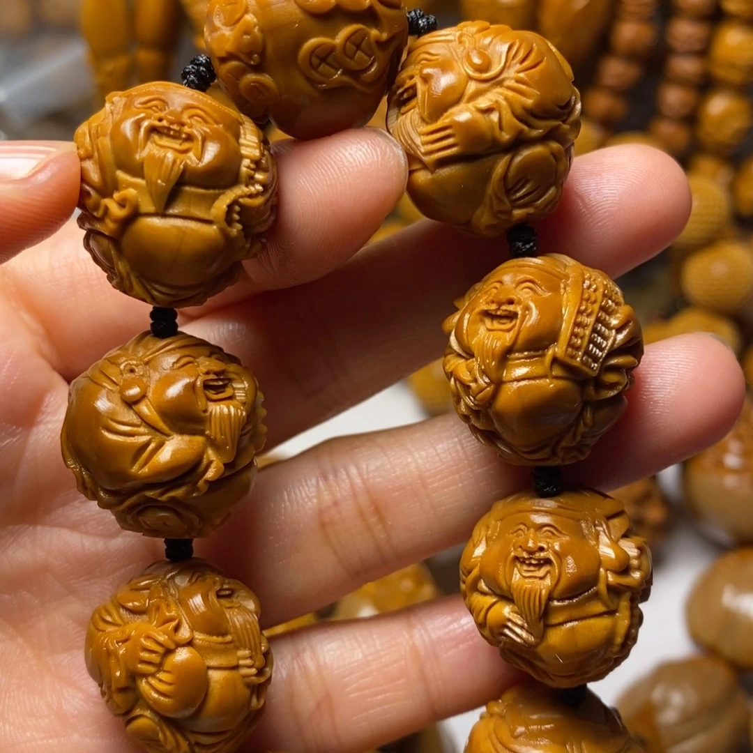 吴***畏橄榄核手串/手链八大财神
