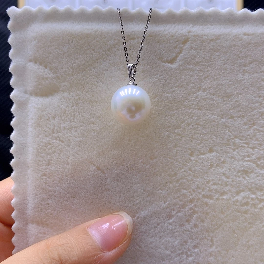 秦***宝淡水珍珠银S925镶嵌吊坠(赠链)