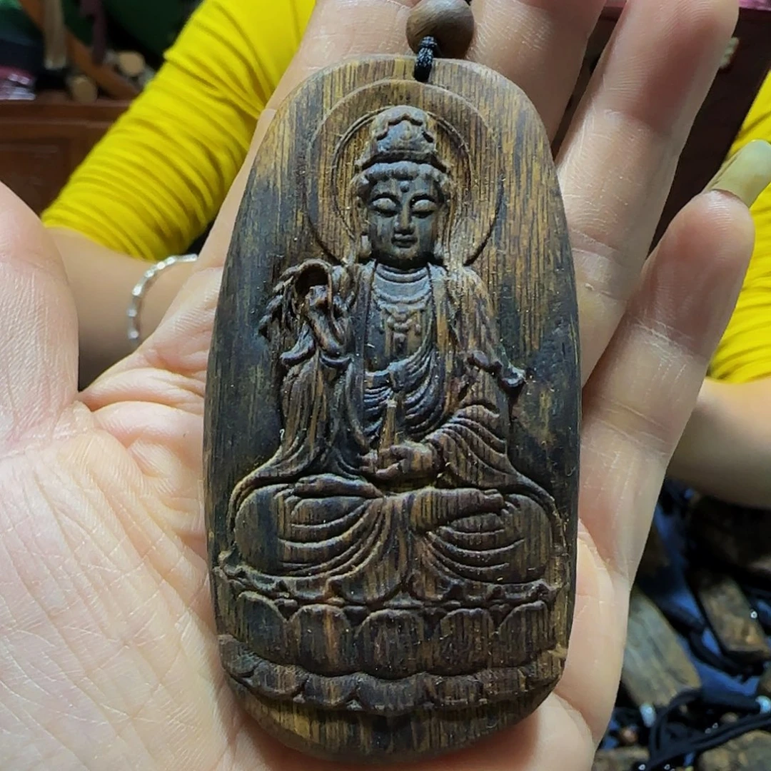 沉香碎屑沉香海南国香老白奇乌身老料观音带绳22克