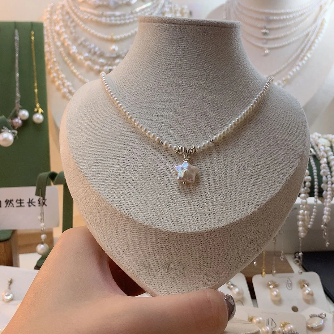 H***_淡水珍珠银S925镶嵌颈饰星星项链
