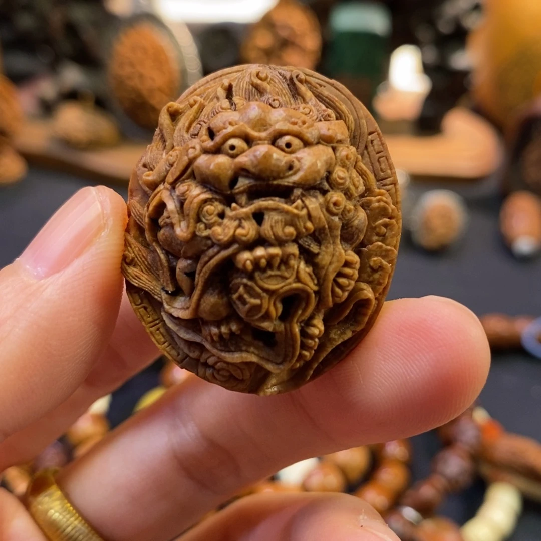潍坊核雕桃核雕刻狮子
