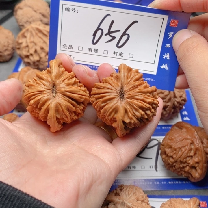 把件桃核42四座楼656号牌