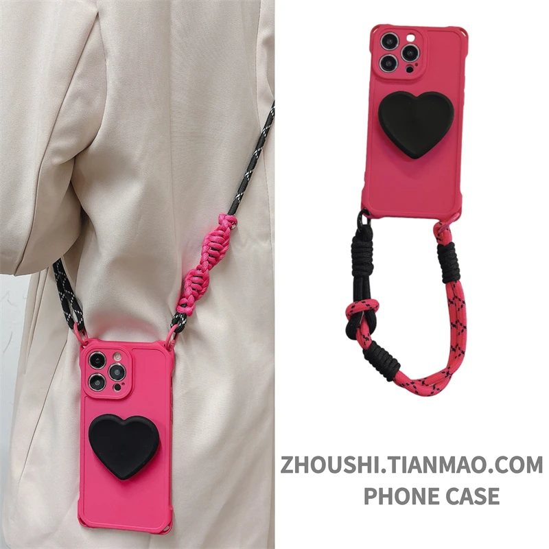 手腕绳创意粉色爱心气囊支架适用苹果16手机壳15plus新款13挂绳斜