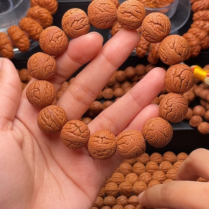 桃核手串金丝龙珠1.6