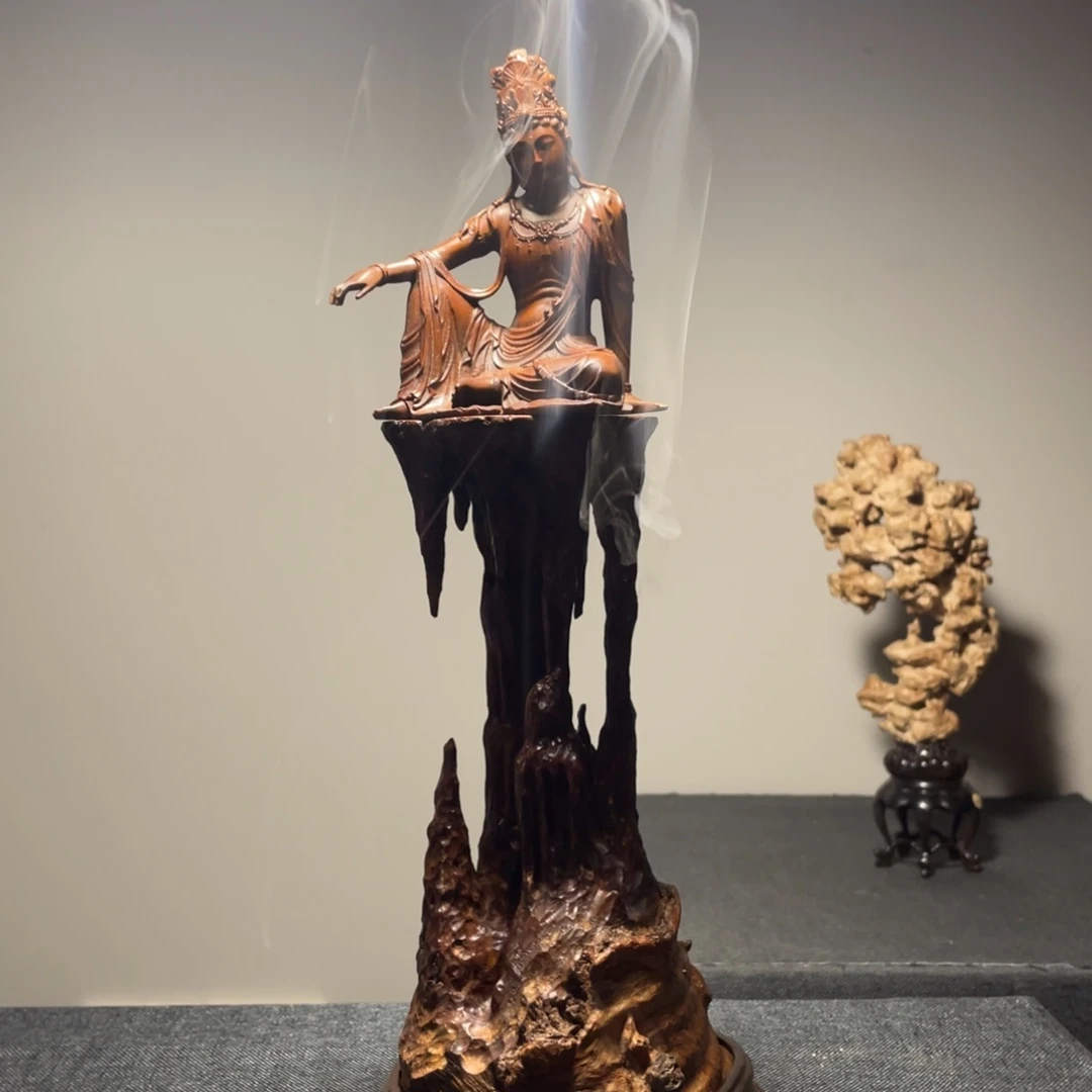 飛***。木质荔枝木底座和黄杨木观音