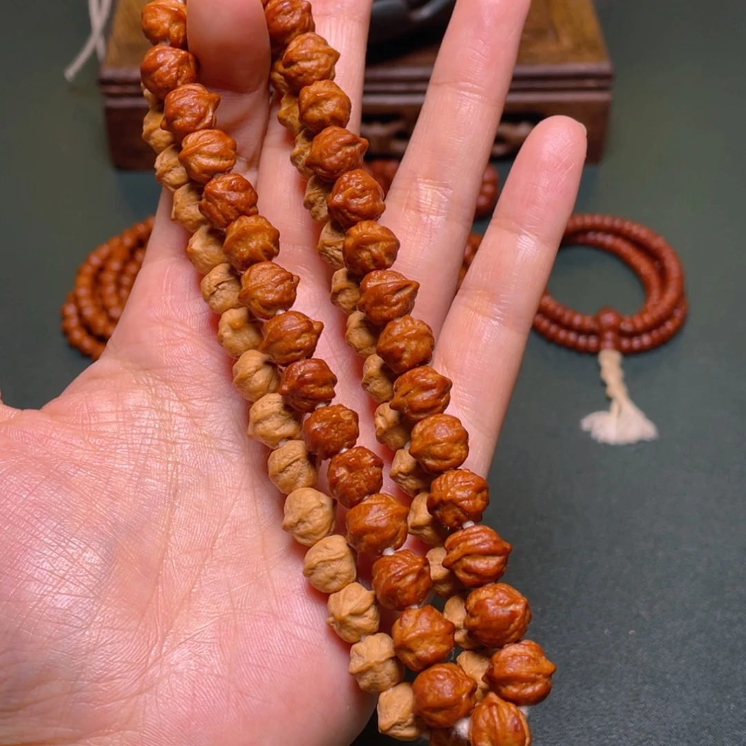 吊坠柏香籽/百香籽白牙横打手持