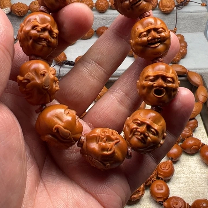 西***徐橄榄核手串橄榄核雕工艺制作