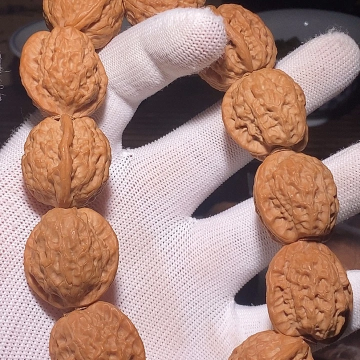 玖***陆文玩核桃手把件野生手持