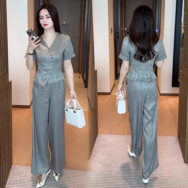 2025夏季新款洋气时尚套装女收腰显瘦百搭不规则上衣阔腿裤两件套