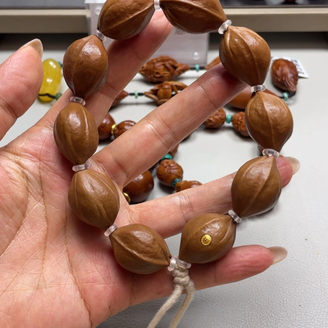 橄榄核吊坠金标铁素
