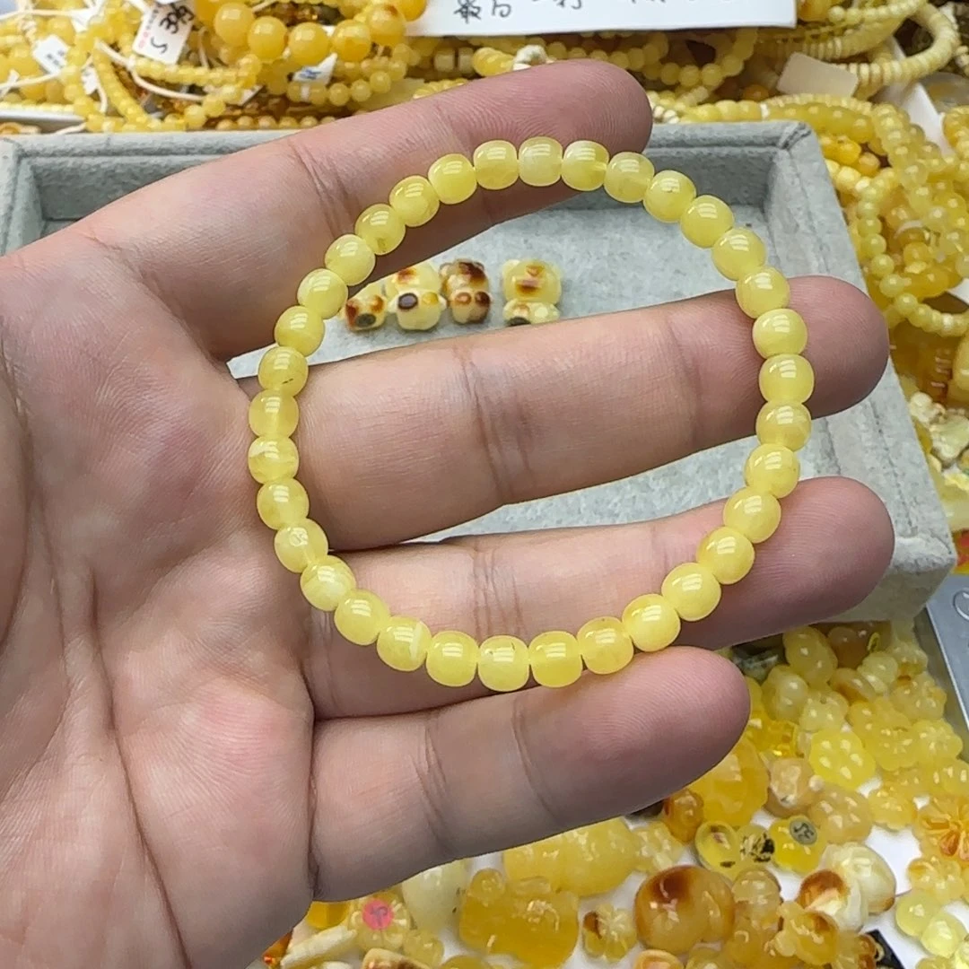 孟***莉琥珀未镶嵌裸石4.3克6mm