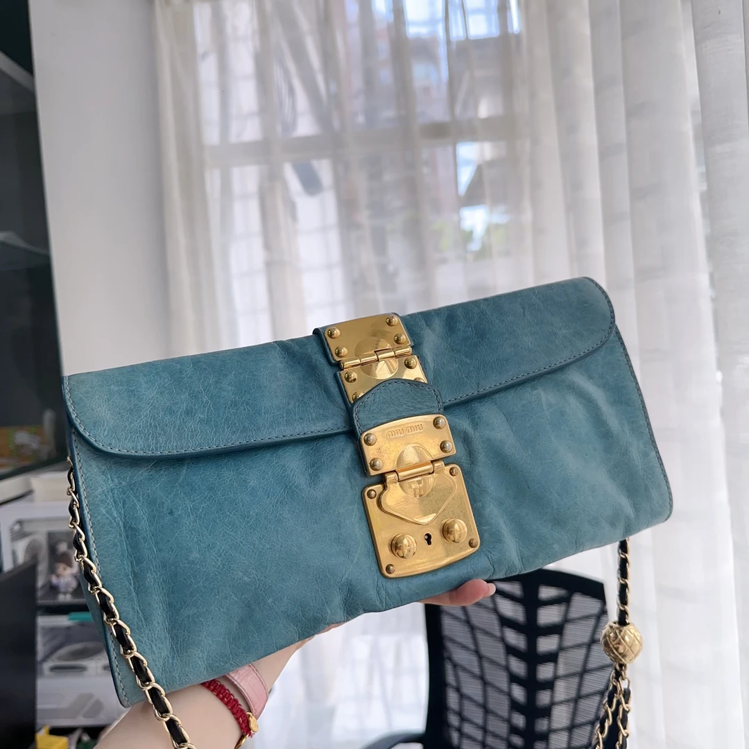 95新 MIU MIU/缪缪 油蜡手拿翻盖晚宴包 TH900