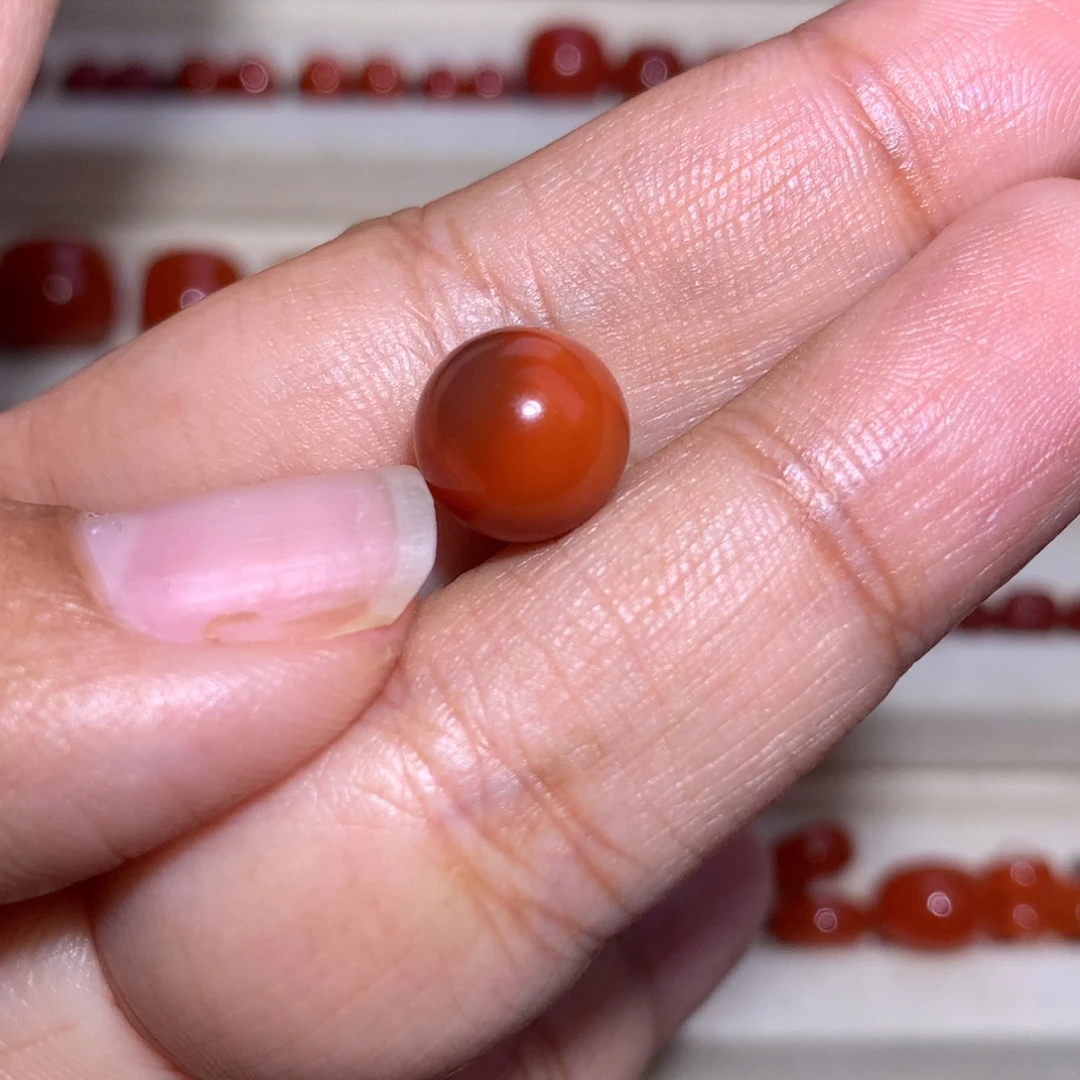 南红玛瑙未镶嵌圆珠9.9柿子红 微过渡