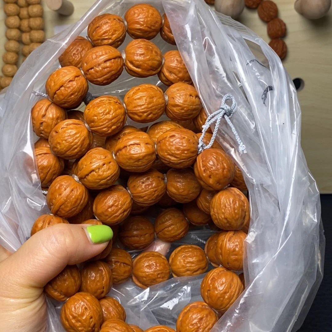 文玩核桃吊坠哈*啊福利手持