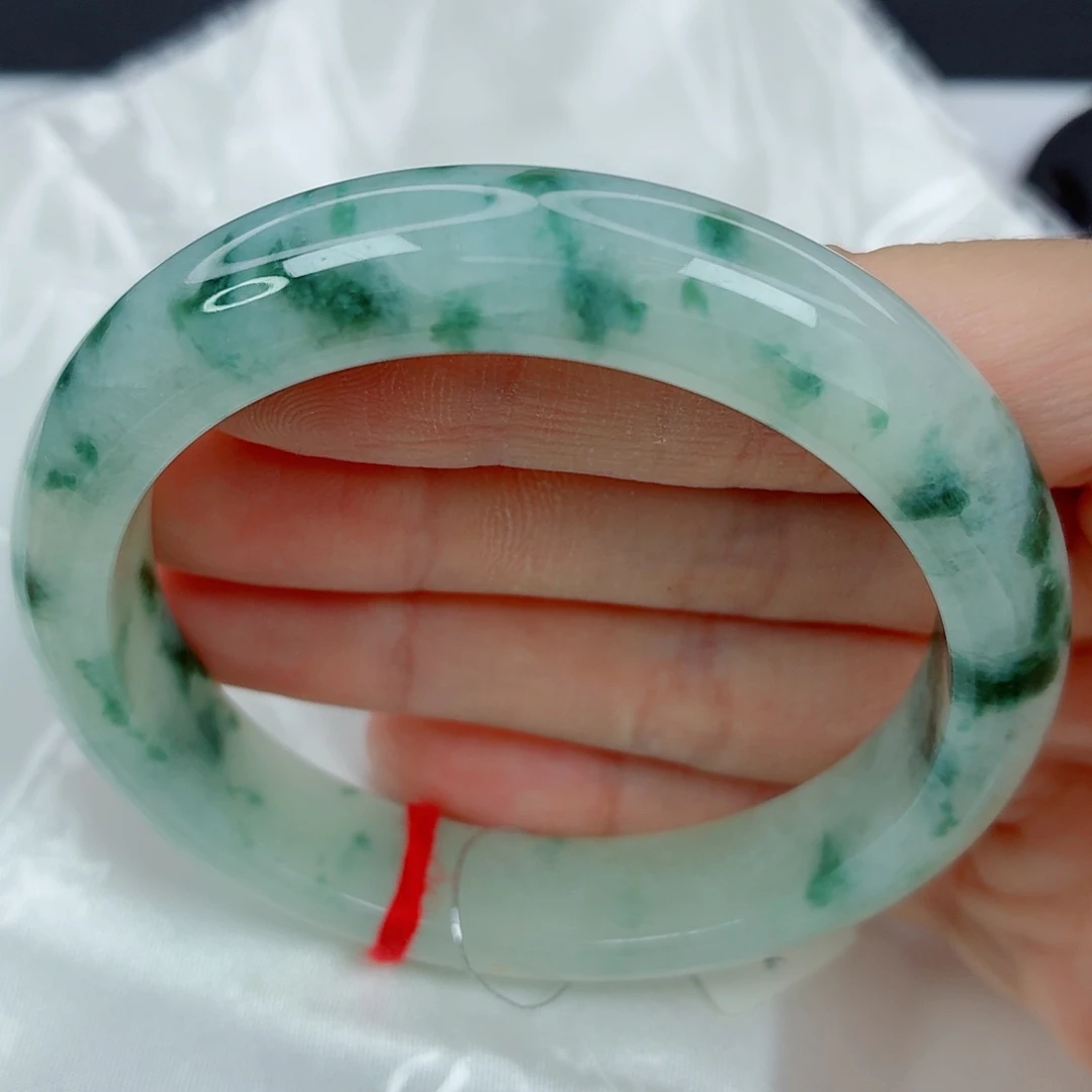 翡翠未镶嵌手镯57.4正圈，飘墨绿花，有纹