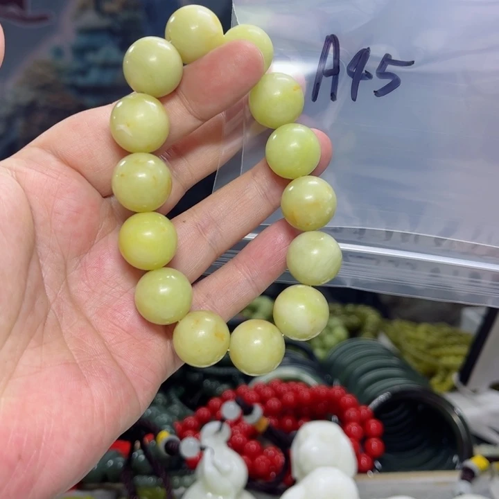 蛇纹石玉手串未镶嵌紫****鞠