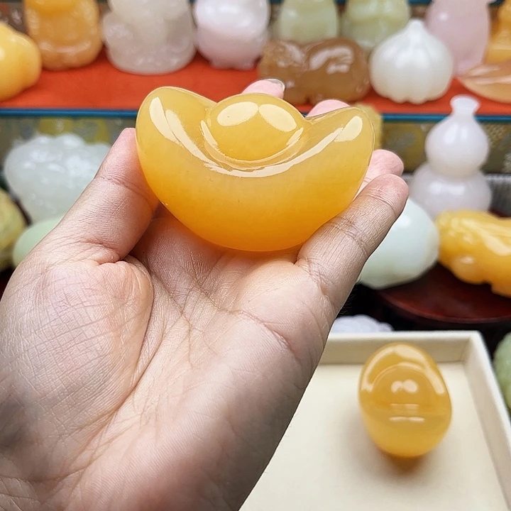 火***人石材元宝手把摆件